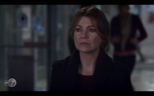 Meredith watching Derek walk away. 